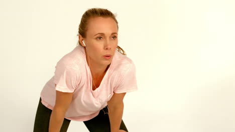 exhausted female runner taking a break