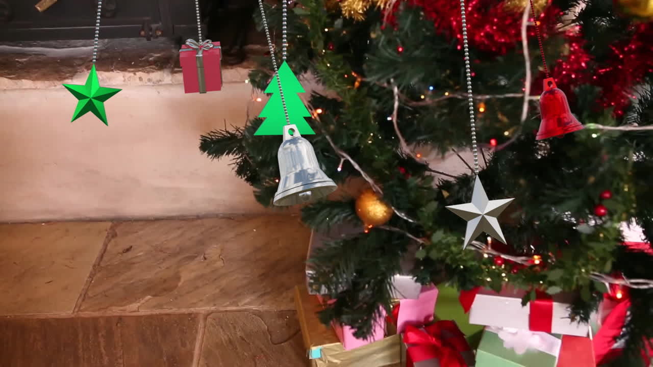 Animation of christmas baubles decorations over christmas tree