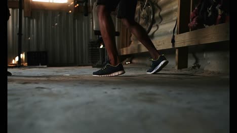 african american male boxer practicing foot movements with trainer in gym 4k