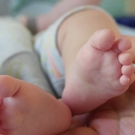 newborn baby feet and hands