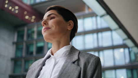 Closeup-confident-businesswoman-going-downtown-street.-Successful-executive-walk