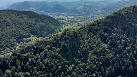 Mountain-Peak-With-Dense-Foliage-In-Romania-On-A-Sunny-Day