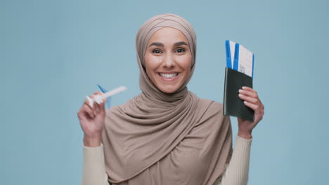 excited woman with travel documents