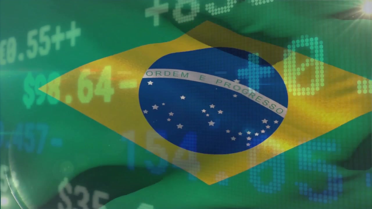 Brasiliansk flag svæver over et finansielt dashboard, med valutaikoner og aktiekurser.