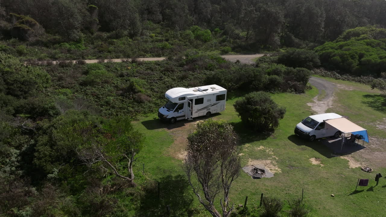 Motorhome on campground on a sunny day at Gillard's campground in Australia