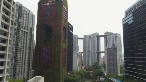 singapore cityscape with modern architecture and green wall