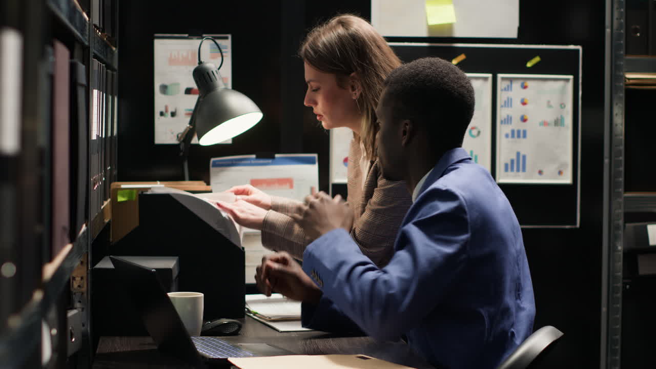 Team working on financial reports in office