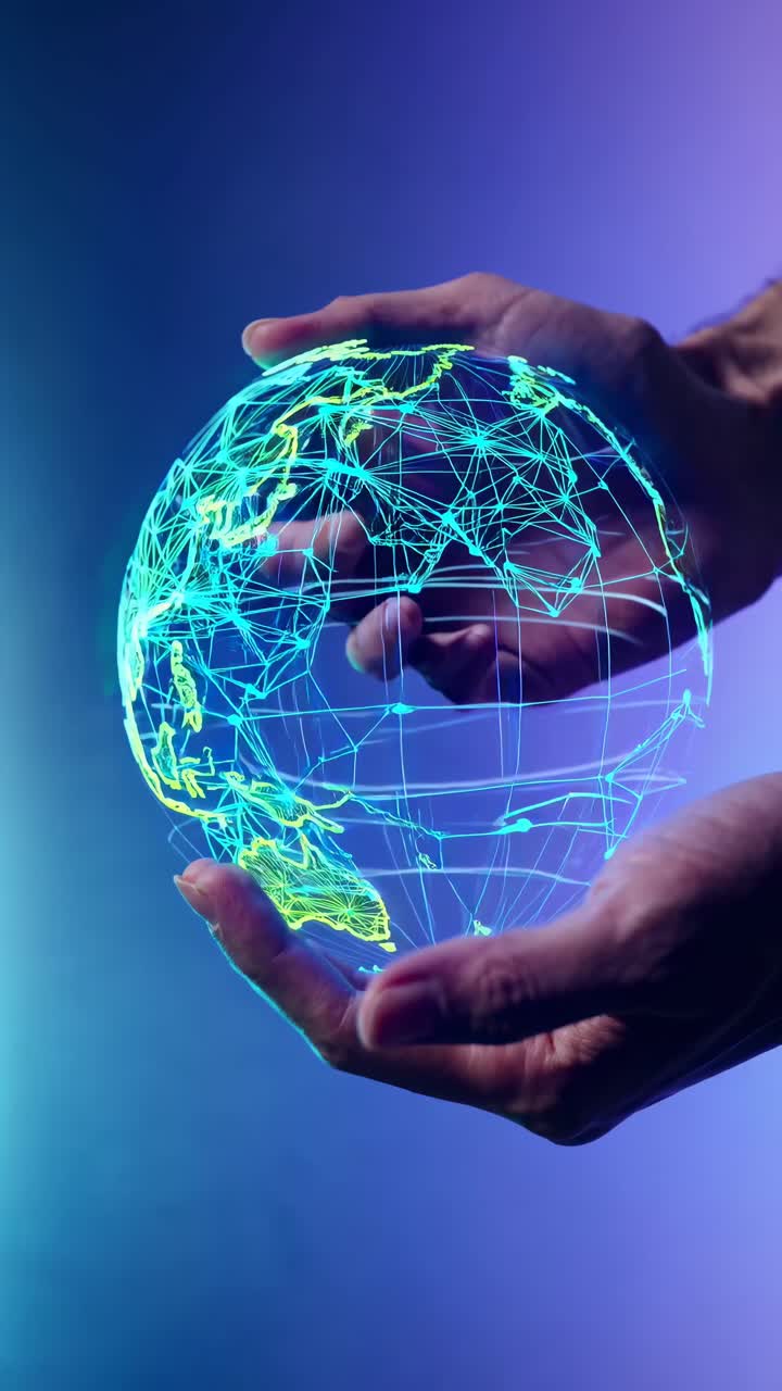 Futuristic video concept with hands holding a digital globe