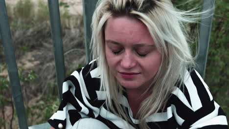 close view of depressed woman crying outdoor