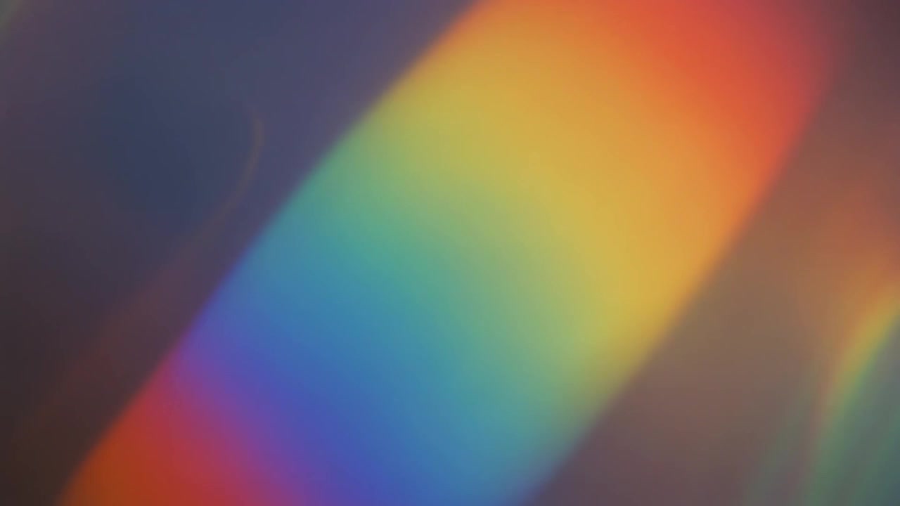Fughe di luce astratte e bagliori prismatici arcobaleno