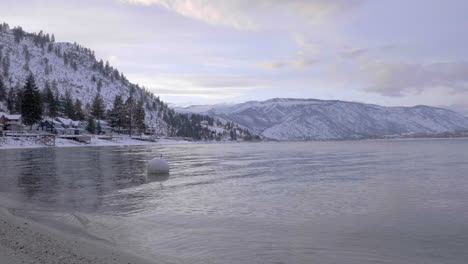 lake chelan in washington state during the winter with everything snowed