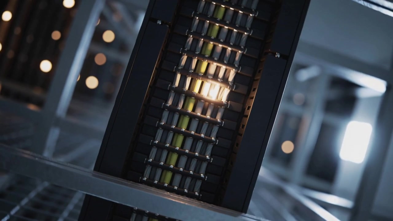 Rotating camera revealing light fixture grille in warehouse ceiling, showing metal framework, bokeh