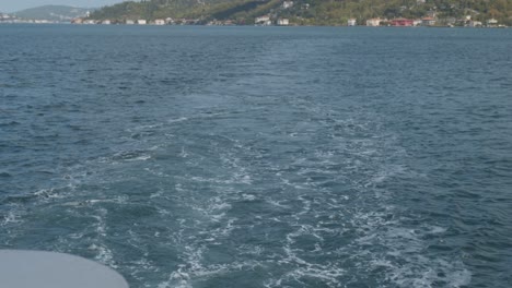 Boats-wake-reveals-Bosphorus-suspension-bridge-from-Asian-continent