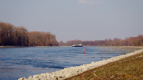 industrial transport ship sailing with gas or liquids on the rhine near karlsruhe, germany