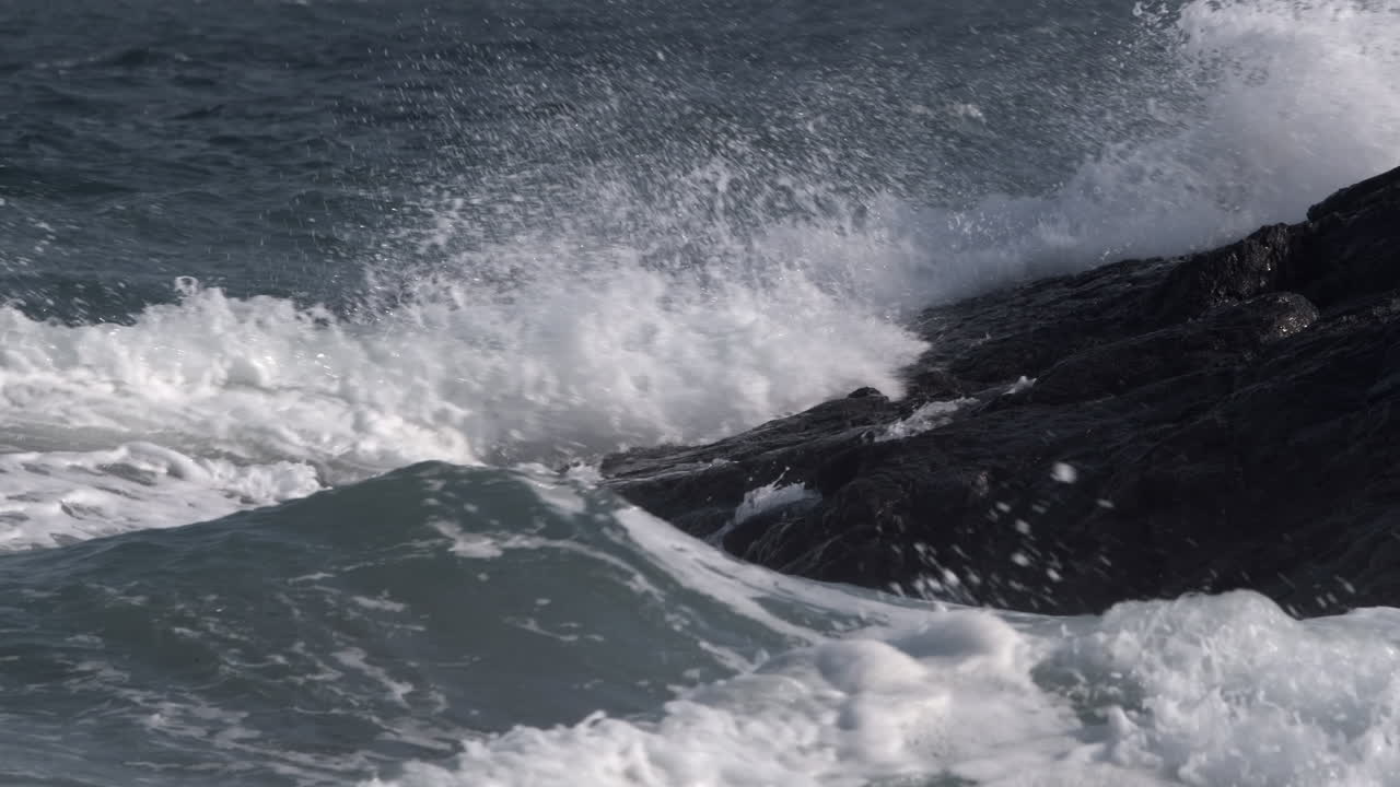 Incoming tidal waves off the south coast of Cornwall, England.