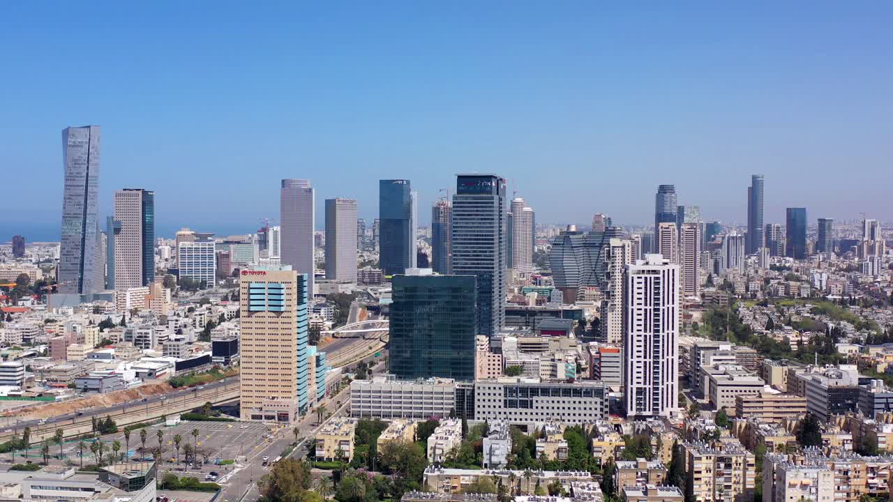 Aerial view of a modern city skyline with high-rise buildings