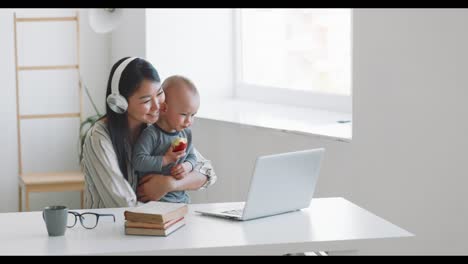 mother working from home with baby