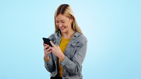 Winner,-woman-and-phone-with-fist-celebration