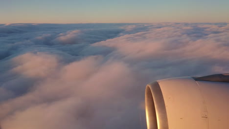 aeral view from above the clouds on board of a jet airplane a330