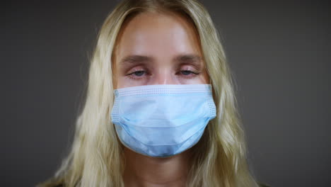 Young-Blonde-Woman-Wearing-Face-Mask