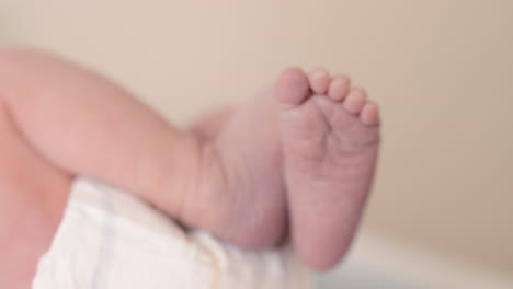 newborn baby moving feet