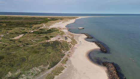 aerial of nazi bunkers along grenen beach, skagen, denmark