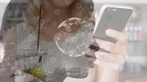 animation of cityscape and biracial woman over caucasian businesswoman using smartphone