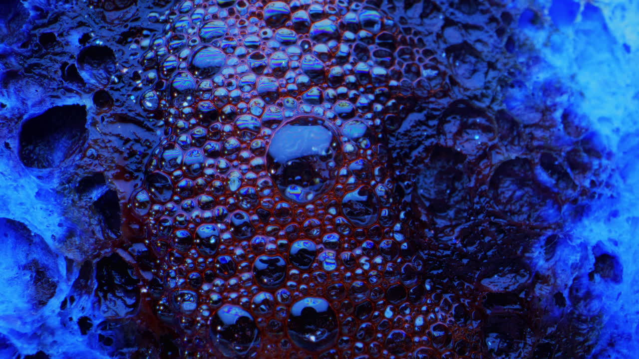 Close-up of colorful bubbles and liquid patterns