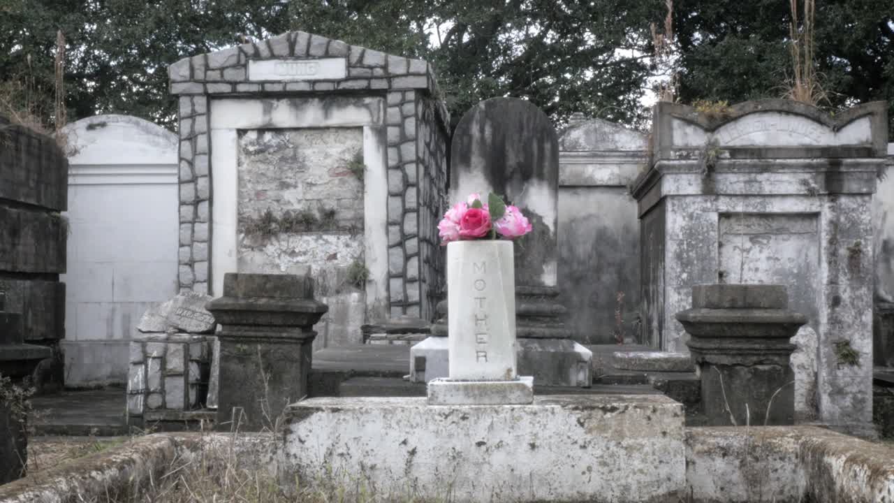 Zoom in on a Gravestone With the Inscription "Mother" in a Cemetery
