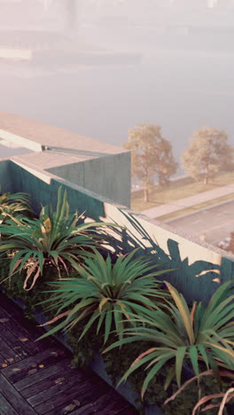 un jardín en el techo con vistas a una ciudad de niebla