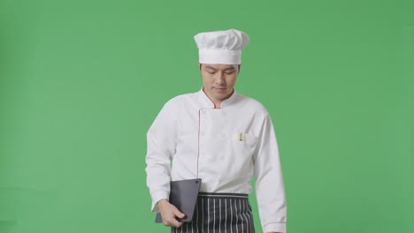 chef holding tablet