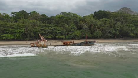 Popular-tourist-attraction-Manzanillo-shipwreck-on-coast-of-Costa-Rica,-aerial