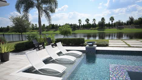 beautiful luxury outdoor spa and zero entry pool with iridescent outdoor tile