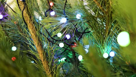 christmas tree garland decoration of the christmas tree closeup