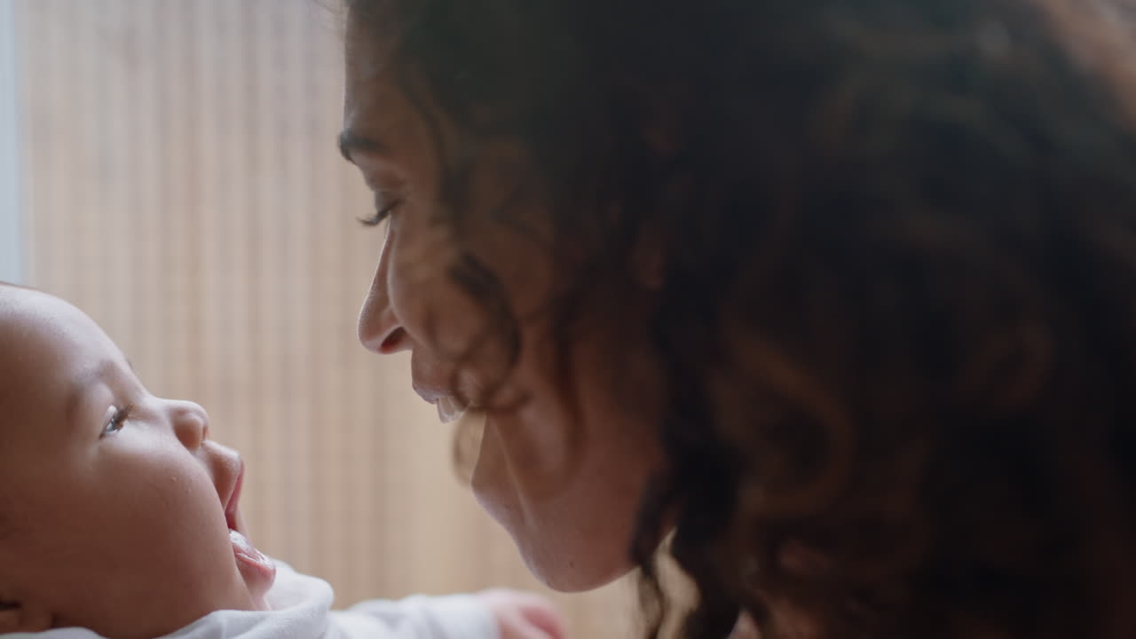 happy mother playing with baby at home loving mom nurturing toddler having fun parent bonding with child enjoying motherhood childcare