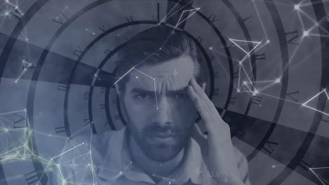 Animation-of-stressed-man-with-network-of-connections-and-clock-spinning-in-the-background