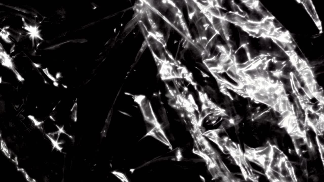 Sovrapposizione di texture in plastica trasparente lucida e stropicciata