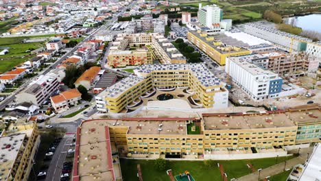 aerial vista of urban splendor: drone footage revealing residential zone near the city, showcasing architectural diversity and vibrant city living