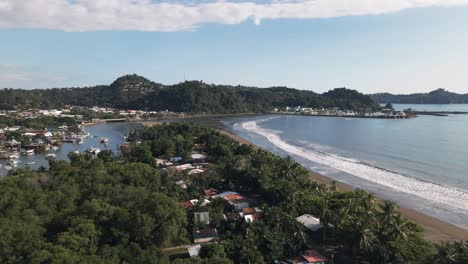 The-port-city-of-Quepos,-Costa-Rica-on-a-sunny-day-viewed-from-Isla-Damas