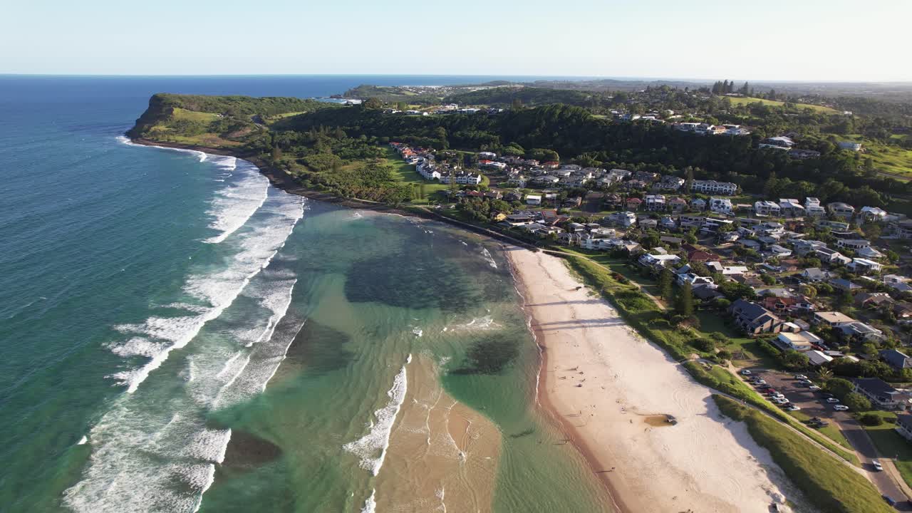 Seven Mile Beach With Picturesque Lennox Point Headland In Lennox Head, New South Wales, Australia. aerial pullback shot