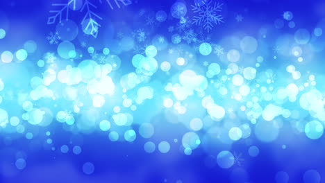 bokeh azul y copos de nieve cayendo con feliz año nuevo y feliz navidad