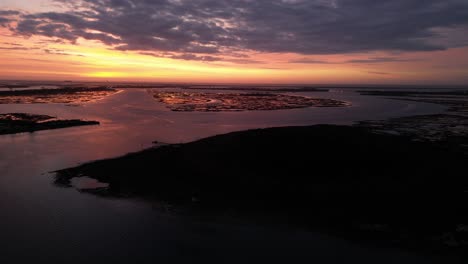 a high angle aerial view of a bay on long island, ny at sunrise