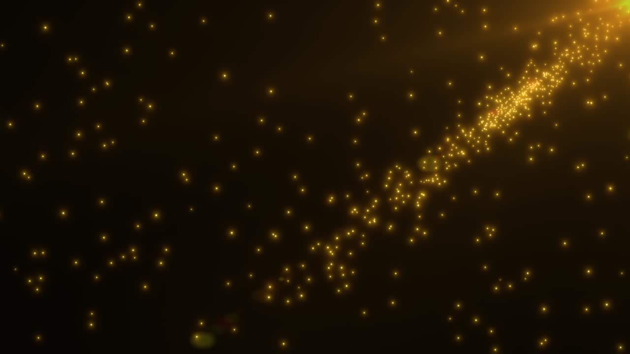New year and Christmas 2021 background. Abstract motion background shining gold particles with lens flare. Shimmering Glittering Particles With Bokeh.Seamless 4K loop video animation