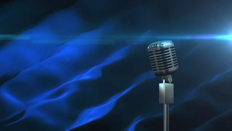 micrófono contra formas líquidas azules sobre fondo negro