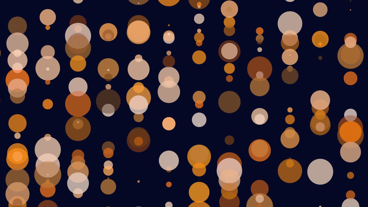 A vibrant and visually appealing pattern consisting of various sized circles in a range of colors set against a dark backdrop