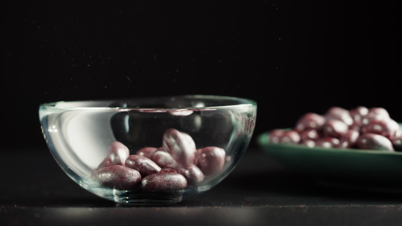 Purple Candies in a Glass Bowl