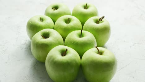 ripe green apples in drops