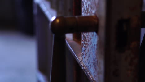 Alcatraz-Prison-Detail,-Metal-Door-Handle-in-Cellhouse-Block,-Close-Up