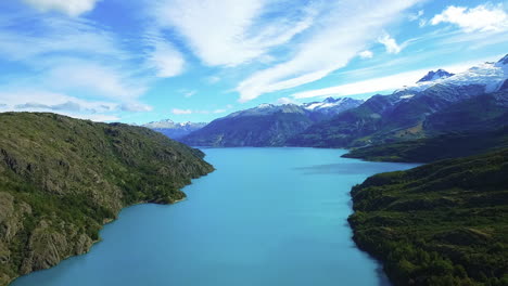 Antena---General-Carrera-Lago-Y-Andes,-Patagonia,-Chile,-Wide-Shot-Pan-Right