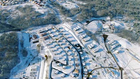 aerial view of a snow-covered residential development